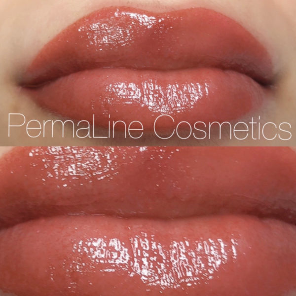 A close up of a woman's lips with the words permaline cosmetics.