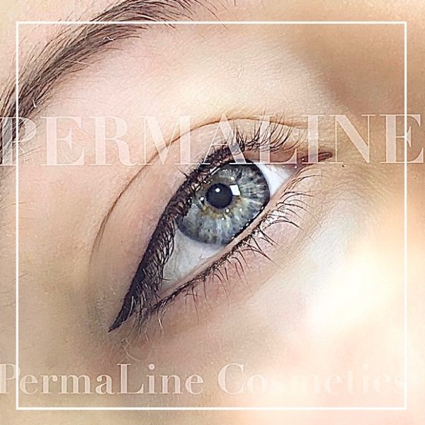 A close up of a woman's eye with the words permaline cosmetics.